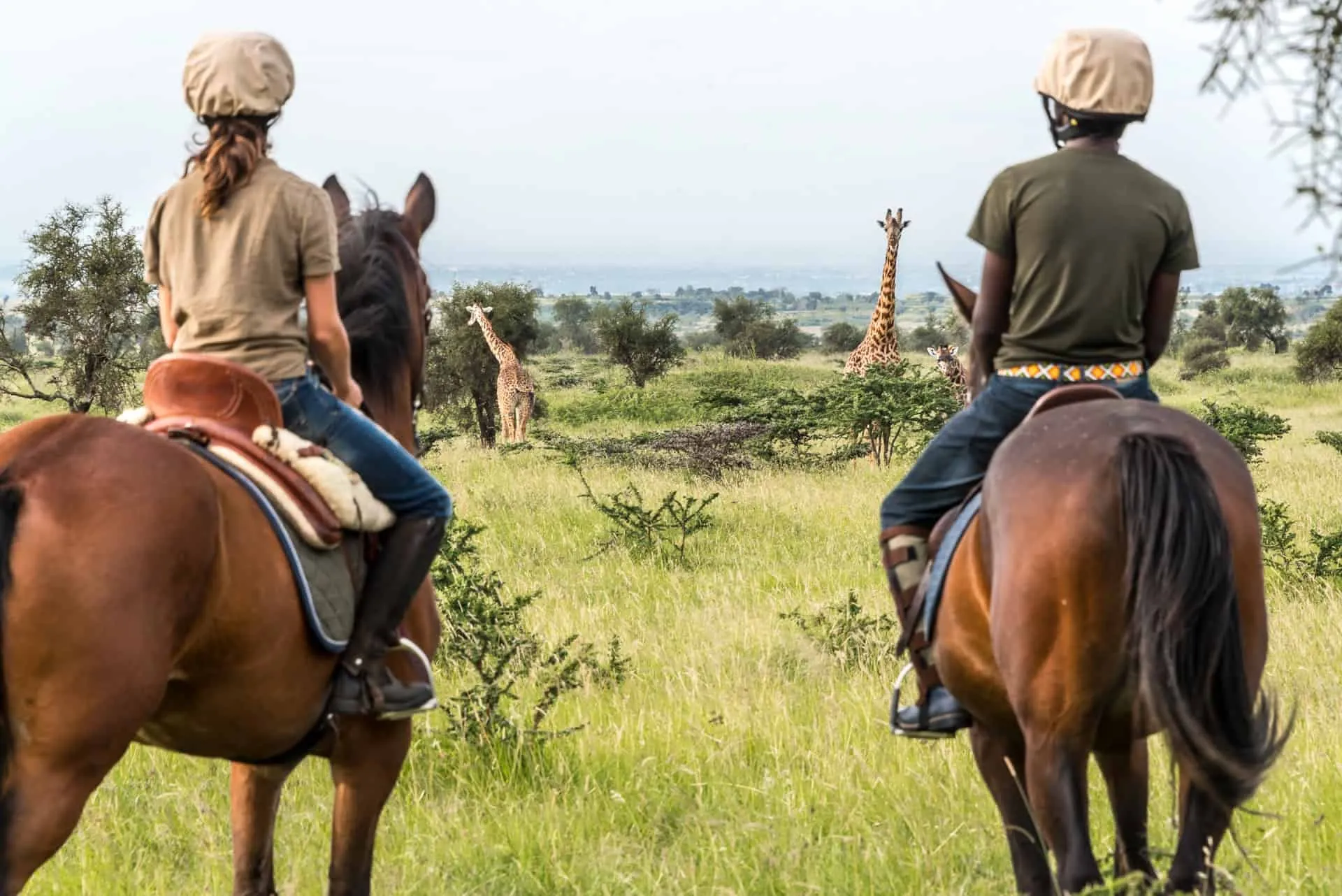 Horseback riding during Kenya safari in Masai Mara - tour of Kenya